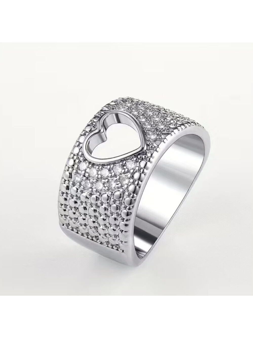 Titanium Ring with Hollowed Heart and Inlaid Zirconia Fashion Accessory